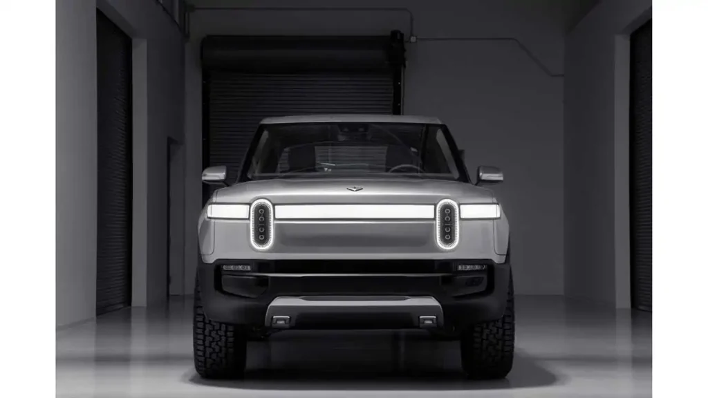 Front end of a Rivian R1T showing the upright fascia that takes direct stone strikes